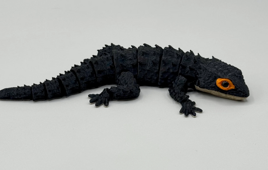 Rotaugen-Krokodilskink – Der kleine Drache für deine Sammlung!